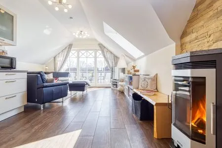 Blick ins Wohnzimmer mit Kaminofen Neue Reihe Neue Reihe 28 - Wohnung Vogelnest