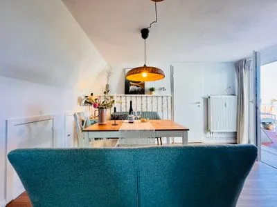 Wohnzimmer mit Essplatz und Meerblick Nordkiek No. 8