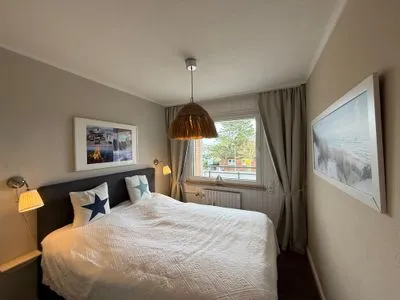 Schlafzimmer Ferienwohnung im Haus Nordland App 34