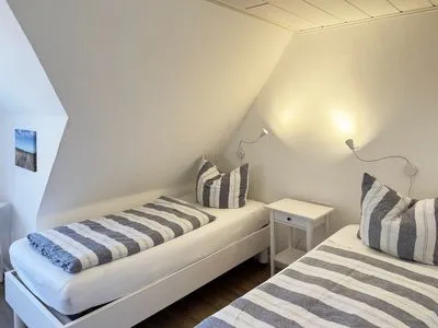 Schlafzimmer Haus Frisia Ferienwohnung Frisia 5