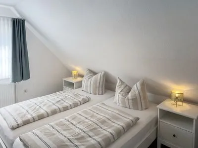 Schlafzimmer Haus Frisia Ferienwohnung Frisia 4