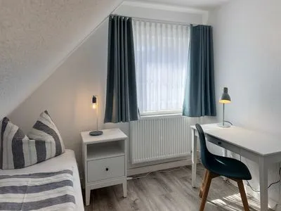 Schlafzimmer Haus Frisia Ferienwohnung Frisia 4