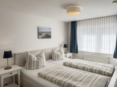 Schlafzimmer Haus Frisia Ferienwohnung Frisia 3