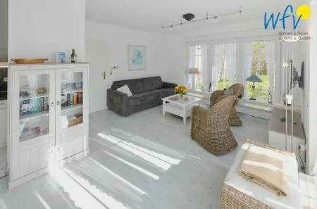 Wohnzimmer Haus vorm Riff Ferienwohnung Memmertfeuer