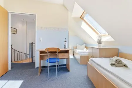 Schlafzimmer mit zwei Einzelbetten Am Deich Am Deich Haus 24