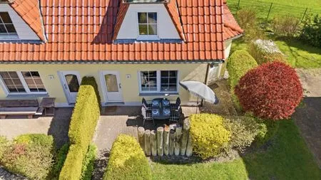 Terrasse mit Sonnenschirm und Grill Am Deich Am Deich Haus 24
