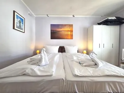 Schlafzimmer Fürstenhof App. 405 - mit Balkon und Meerblick