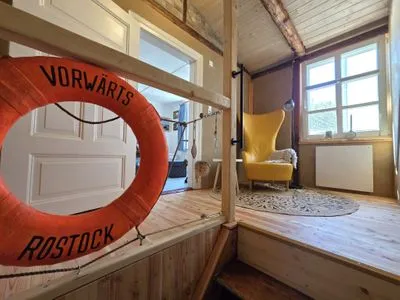Wohnzimmer Kleine Fischerhütte - uriges Ferienhaus am Meer