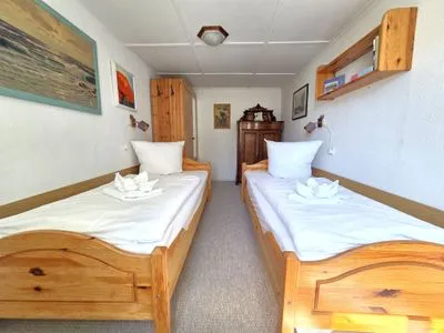 Schlafzimmer Kleine Fischerhütte - uriges Ferienhaus am Meer