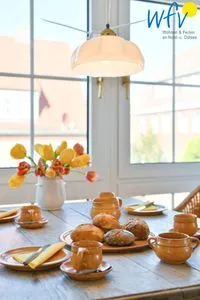 Wohnzimmer Haus Tide Ferienwohnung Bremer