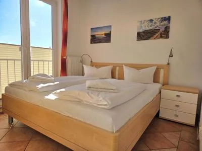 Schlafzimmer Ferienwohnung Kutterfisch - direkt im Stadthafen