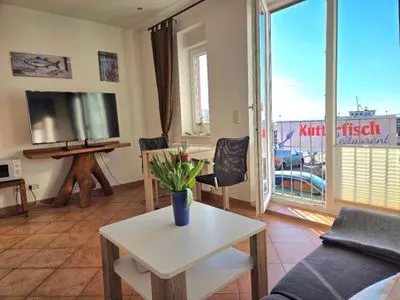 Wohnzimmer Ferienwohnung Kutterfisch - direkt im Stadthafen