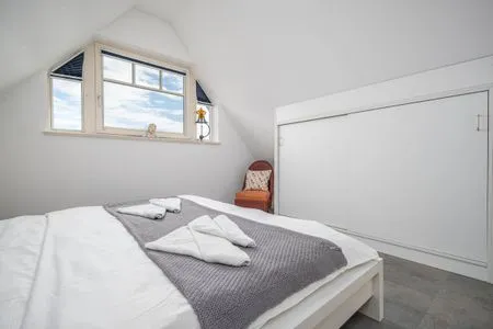 Schlafzimmer mit Doppelbett Mühlenstrasse 23 - Wohnung Oberdeck