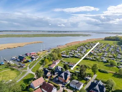 Blick auf das Haus und den Bodden Mühlenstrasse 23 - Wohnung Oberdeck