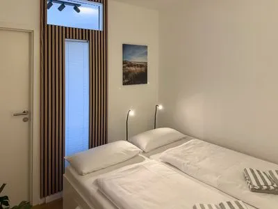 Schlafzimmer Haus Nordenlicht Ferienwohnung "Lütj Seeröver"