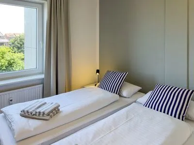 Schlafzimmer Haus Nordenlicht Ferienwohnung "Lütj Seeröver"