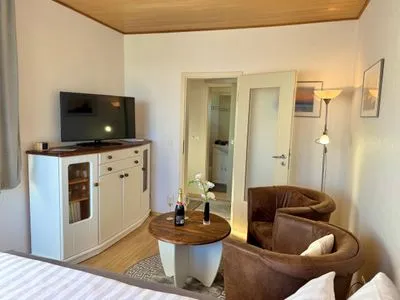 Wohnzimmer Ferienhaus Seeblick in Sassnitz auf Rügen mit Terrasse