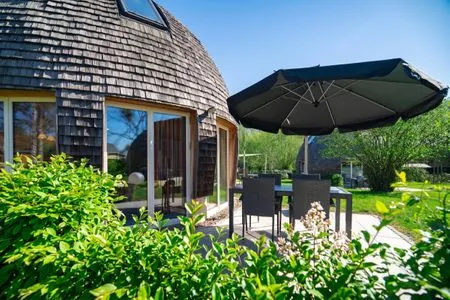 Ferienhaus Tamika am Tollensesee - Terrasse mit Gartenmöbeln  Tamika
