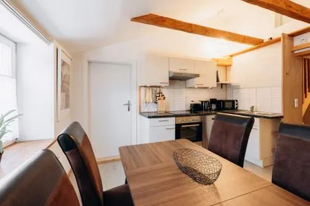 Kitchen and dining area KUL  App. 4 by Alpenidyll Apartments