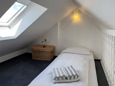 Empore Ferienwohnung „Südspitze 10 mit Meerblick"