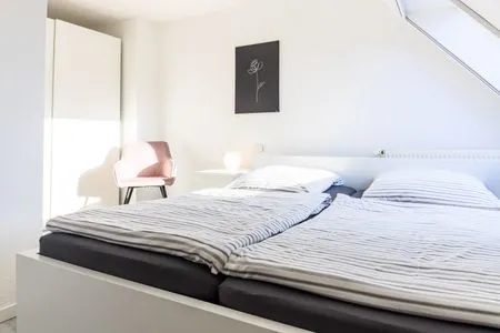 Schlafzimmer mit Doppelbett  Zur Wellenwiese 15