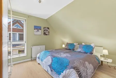 Schlafzimmer mit Doppelbett  Ferienwohnung Seepferdchen