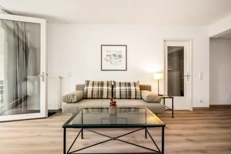 Ferienwohnung Seebär in Zingst - Blick auf die Couch im Wohnzimmer  Seebär