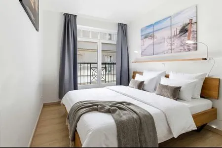 Schlafzimmer Ferienwohnung Küstenkind direkt am Strand, modern eingerichtet mit Meerblick