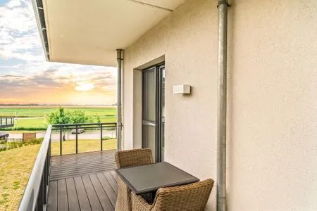 Ferienwohnung Boddenstuv Ostseebad Wustrow - ZweiWasser Alte Seefahrtschule Balkon  Boddenstuv
