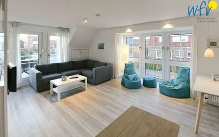 Wohnzimmer Haus Tide Ferienwohnung Calimero