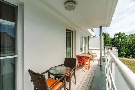 Ferienwohnung Deichkieker Aparthotel Zingst - Blick vom Balkon  Deichkieker