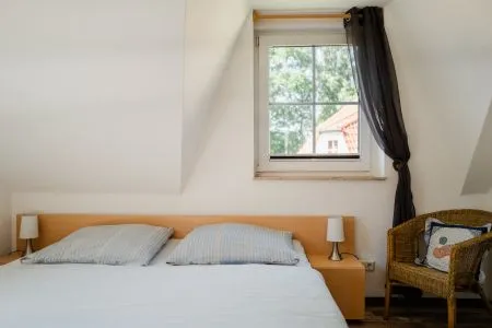 Schlafzimmer mit Doppelbett Am Deich Am Deich Haus 26