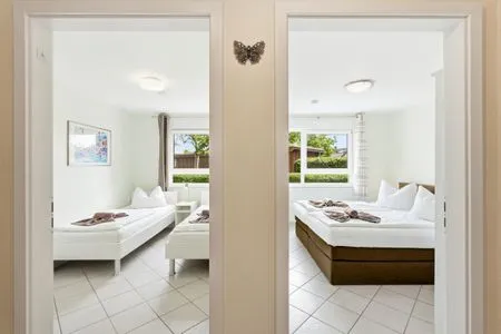 Blick in die Schlafzimmer Residenz am Strand Wohnung 6-74