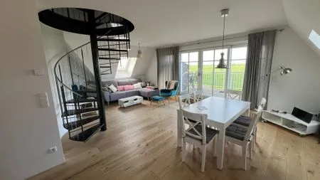 Wohnzimmer Ferienwohnung Inselblick - bis Hiddensee und nach Mön