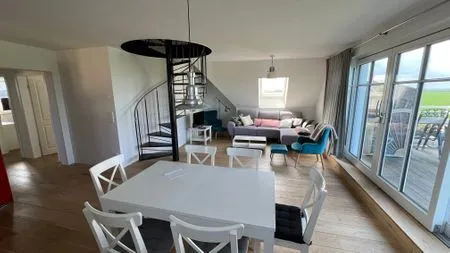 Wohnzimmer Ferienwohnung Inselblick - bis Hiddensee und nach Mön