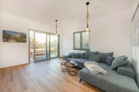Wohnzimmer Ferienhaus "Haffhus" mit Balkon, Terrasse und 2 Bädern
