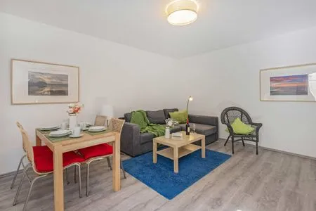 Wohnzimmer Ferienwohnung Kanten nur 500 Meter bis zum Strand mit Sonnenterrasse