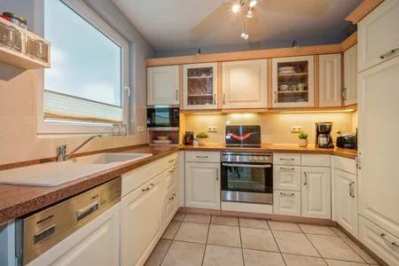 Küche / Küchenzeile Ferienwohnung Nordwind mit Badewanne, Dusche und Terrasse