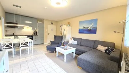 Wohnzimmer Ferienwohnung "Lieblingsplatz" in Kalifornien an der Ostsee
