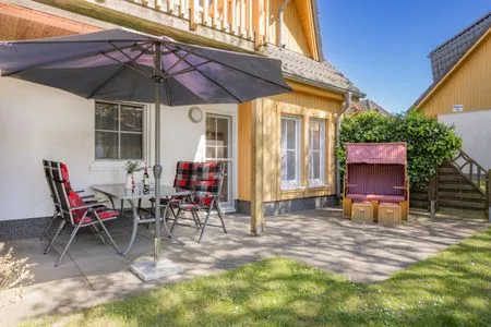 Terrasse Ferienwohnung Inselzauber nur 250 m zum Strand mit Terrasse und Kamin