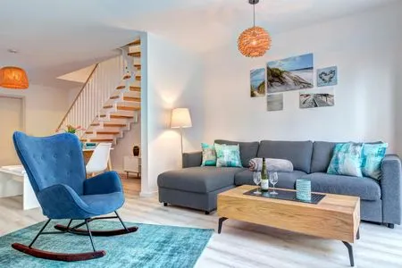 Wohnzimmer Ferienwohnung Ostseenest Bernstein mit Terrasse & nur 800 m zum Strand