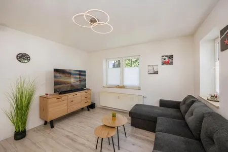 Wohnzimmer Ferienwohnung Achterliek nur 300 m zum Strand mit Balkon