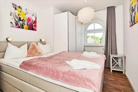 Schlafzimmer Haus Usedom App. MeeresKlang nur 350 m bis zum Strand mit Balkon