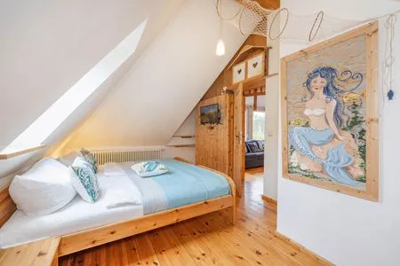 Schlafzimmer Ferienhaus Rad Kapitän direkt am See mit Sauna und Terrasse