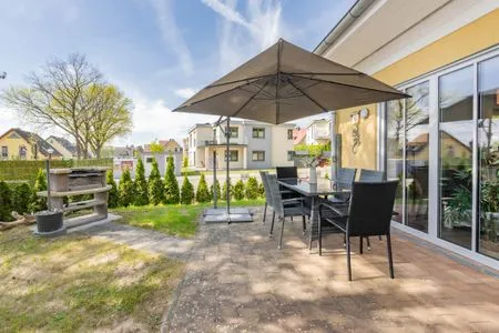 Terrasse Ferienhaus MeerSeenSucht mit Sauna, Terrasse und Grill