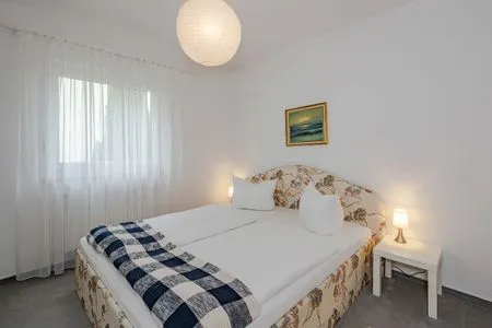 Schlafzimmer Ferienwohnung Gestrandet mit Terrasse, Parkplatz und WLAN