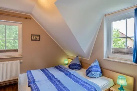 Schlafzimmer mit Doppelbett Am Deich Am Deich Haus 32