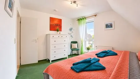 Schlafzimmer mit Doppelbett  Ferienwohnung Jonathan