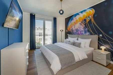 Schlafzimmer Ferienwohnung Goldfisch mit Balkon, Wellness- und Kinderspielbereich