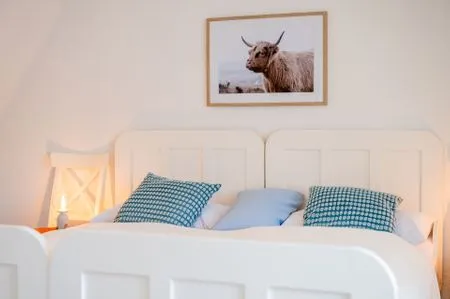 Schlafzimmer mit Meerblick und 2 zusammengestellten Einzelbetten Nordkiek No. 8